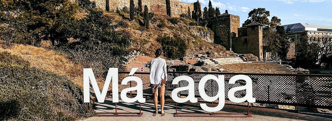 Малага